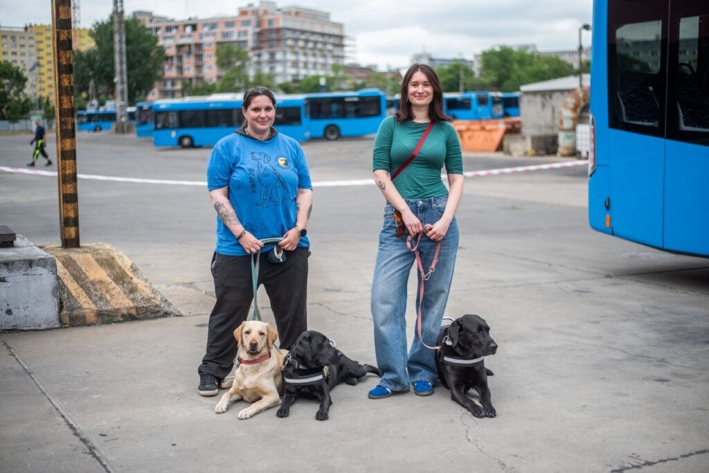 Darinka and Adrienn with their dogs